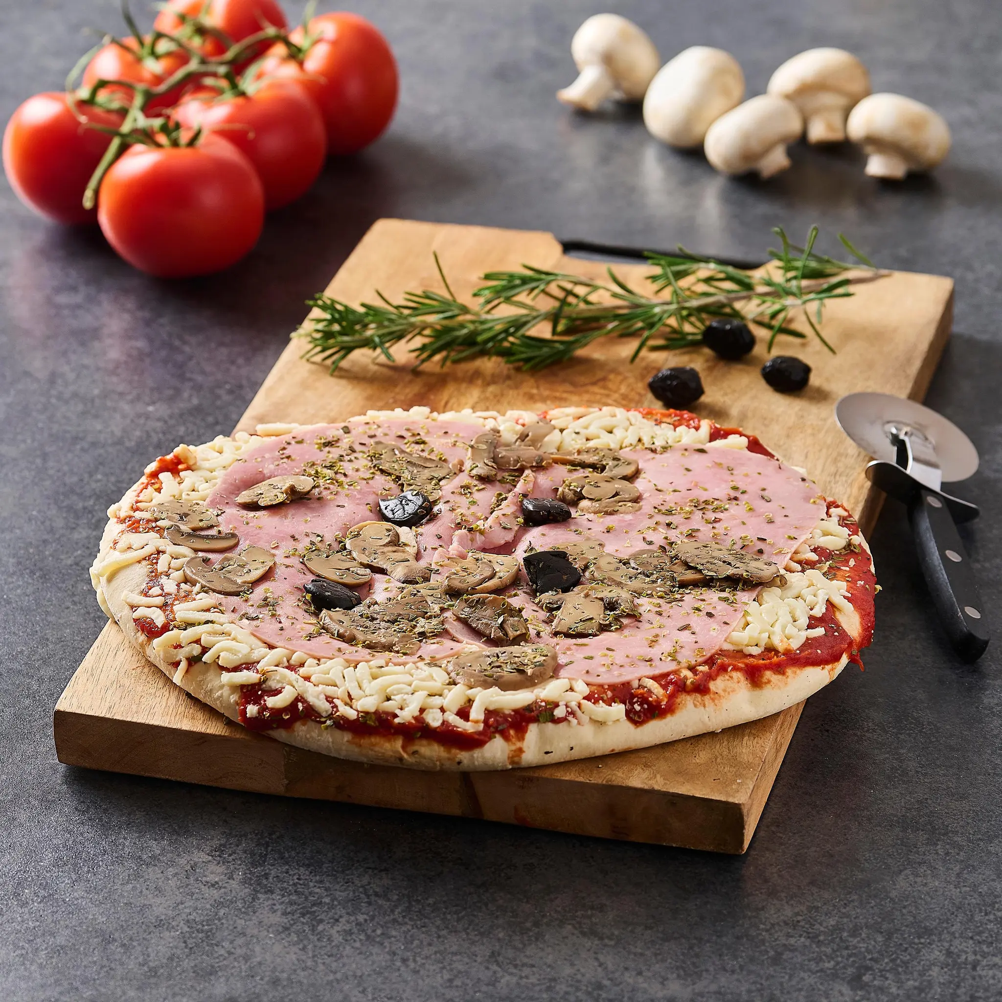 AUCHAN LE TRAITEUR Pizza crue Reine jambon champignons