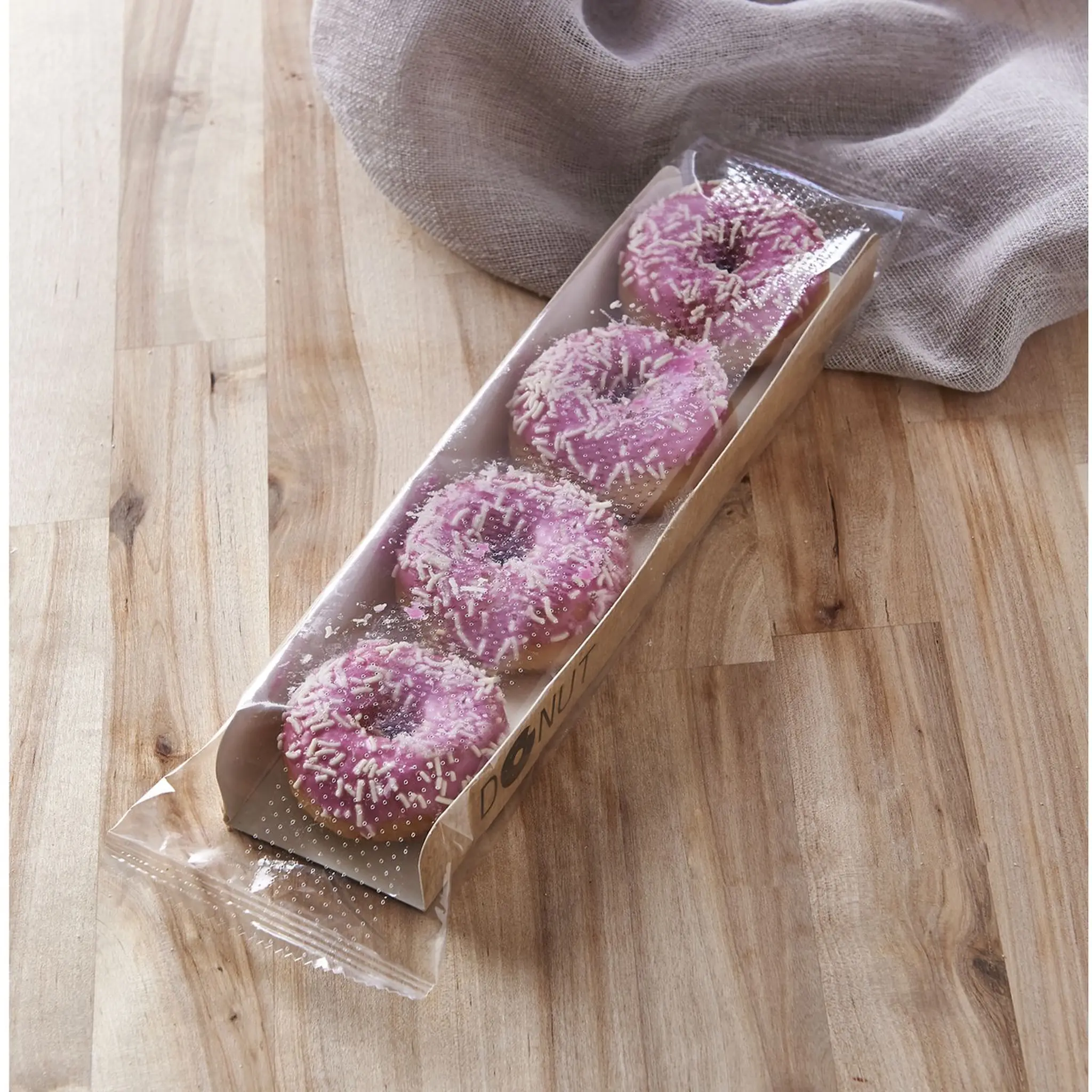 MON PÂTISSIER Mini donuts avec glaçage rose et décor vermicelles en sucre