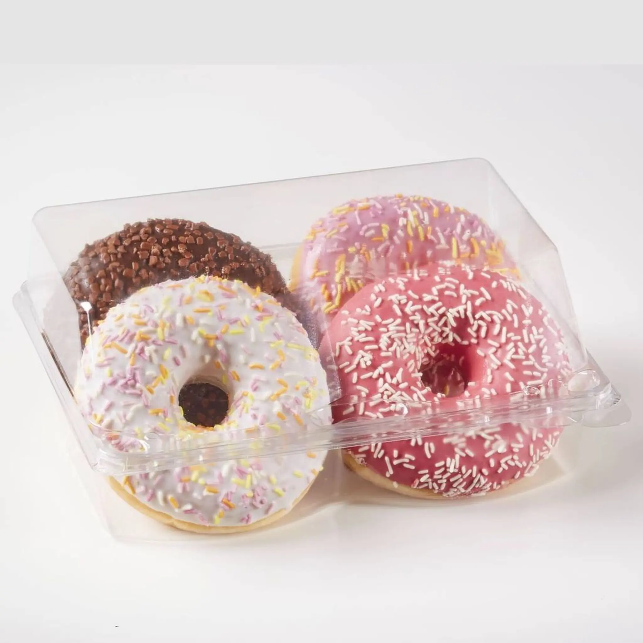 Assortiment de donuts avec glaçage et décor vermicelles